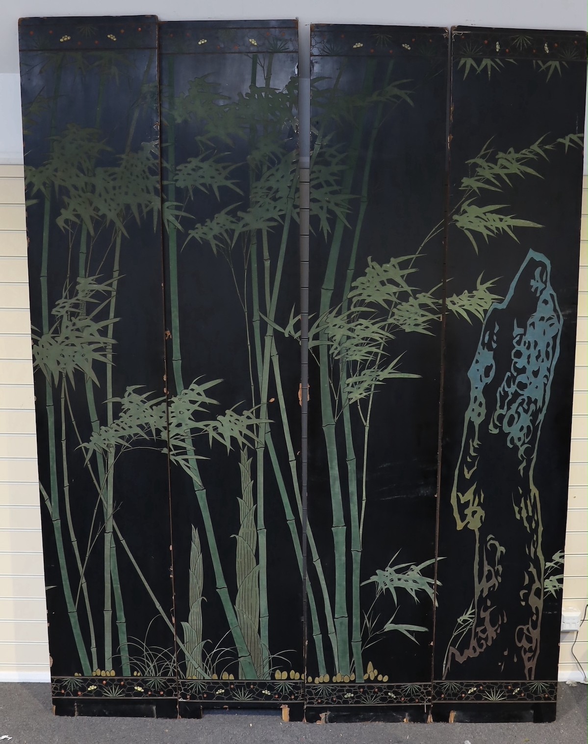 A tall Chinese coromandel lacquer twelve panel screen, 19th century, each leaf panel width 49cm, height 264cm